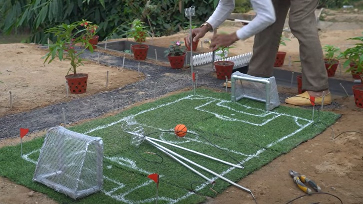 Build Your Own Miniature Soccer Pitch Using RC Vehicles [Video]